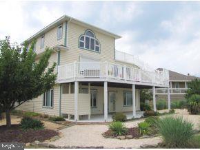 3 Harbor Point Lewes, DE 19958 - Photo 12 of 12 a front view of a house with garden