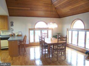 3 Harbor Point Lewes, DE 19958 - Photo 3 of 12 a view of a dining room with furniture window and wooden floor