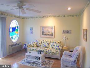 3 Harbor Point Lewes, DE 19958 - Photo 5 of 12 a living room with furniture and a window