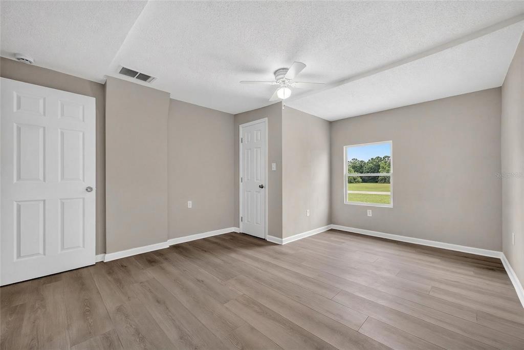 1012 Prescott Lane Holiday, FL 34691 - Photo 27 of 45 a view of an empty room with a window