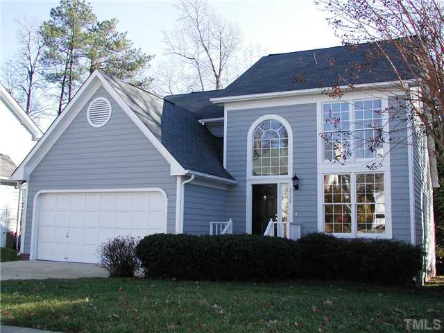 2324 Florida Court Raleigh, NC 27615 - Photo 1 of 17 a front view of a house with a garden