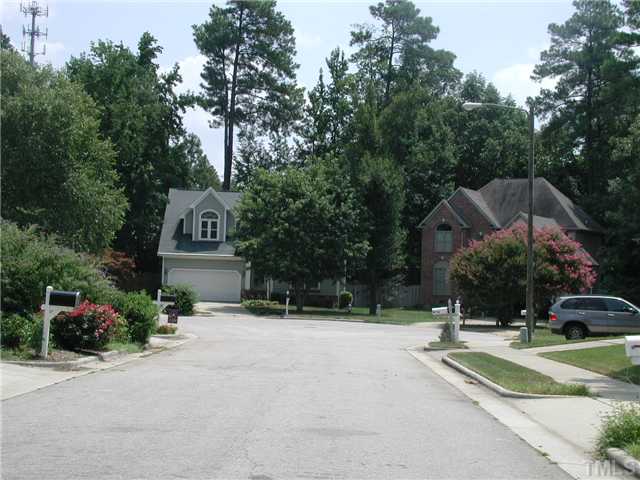 2324 Florida Court Raleigh, NC 27615 - Photo 17 of 17 a front view of a house with a yard and tree s