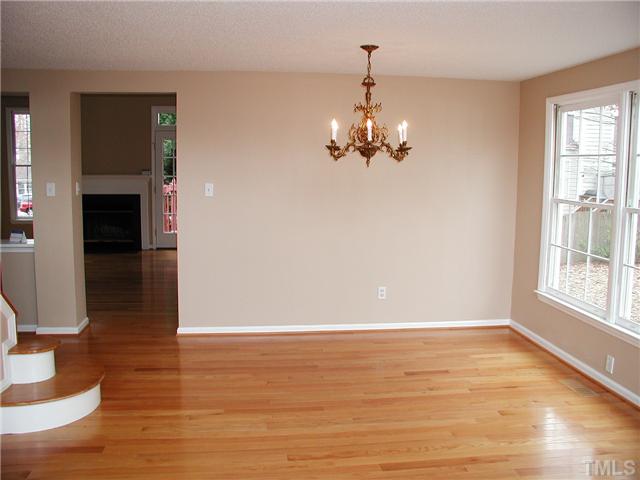 2324 Florida Court Raleigh, NC 27615 - Photo 4 of 17 a view of empty room with wooden floor and window