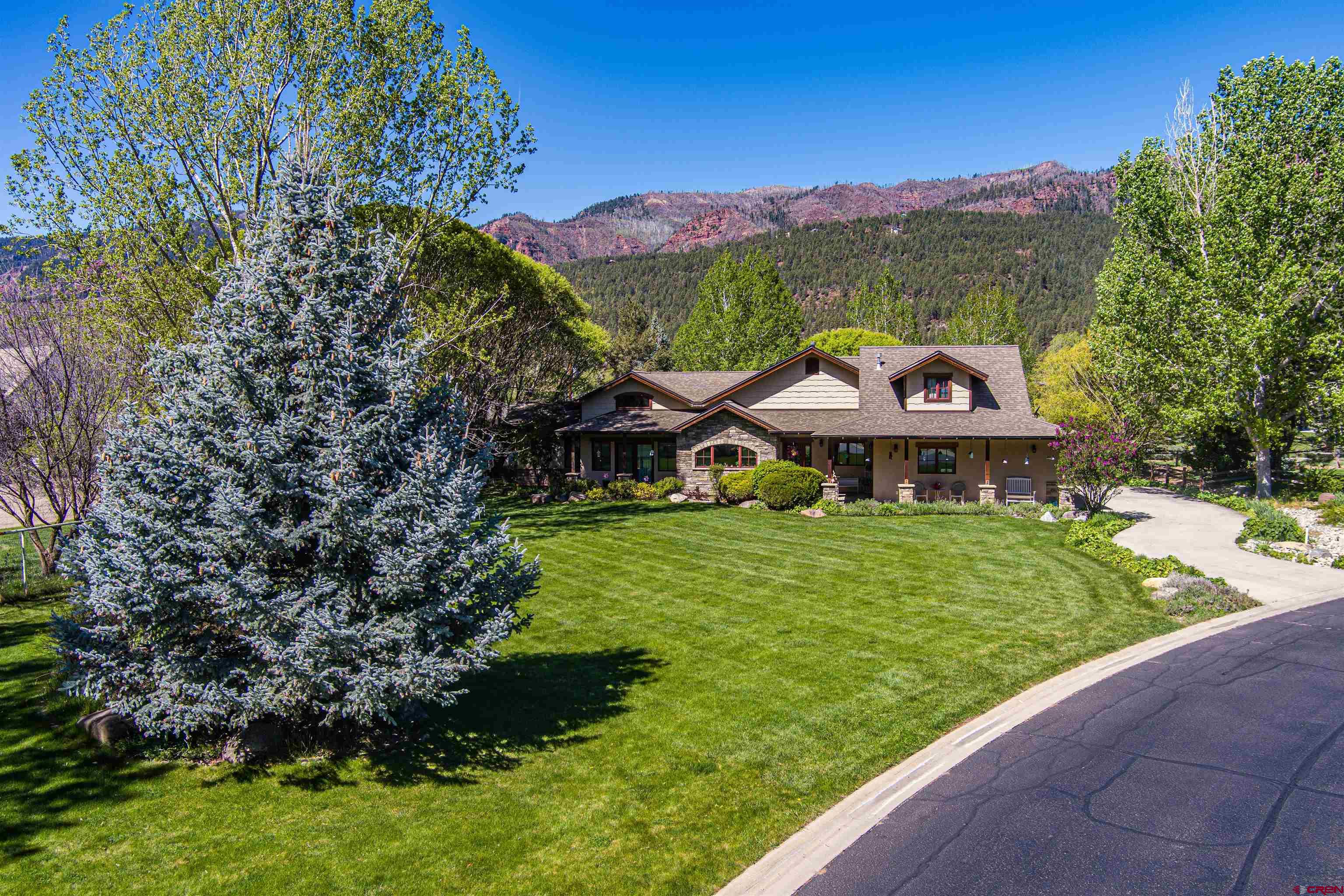 1167 North Dalton Ranch Road Durango, CO 81301 - Photo 44 of 45 a view of a house with a yard