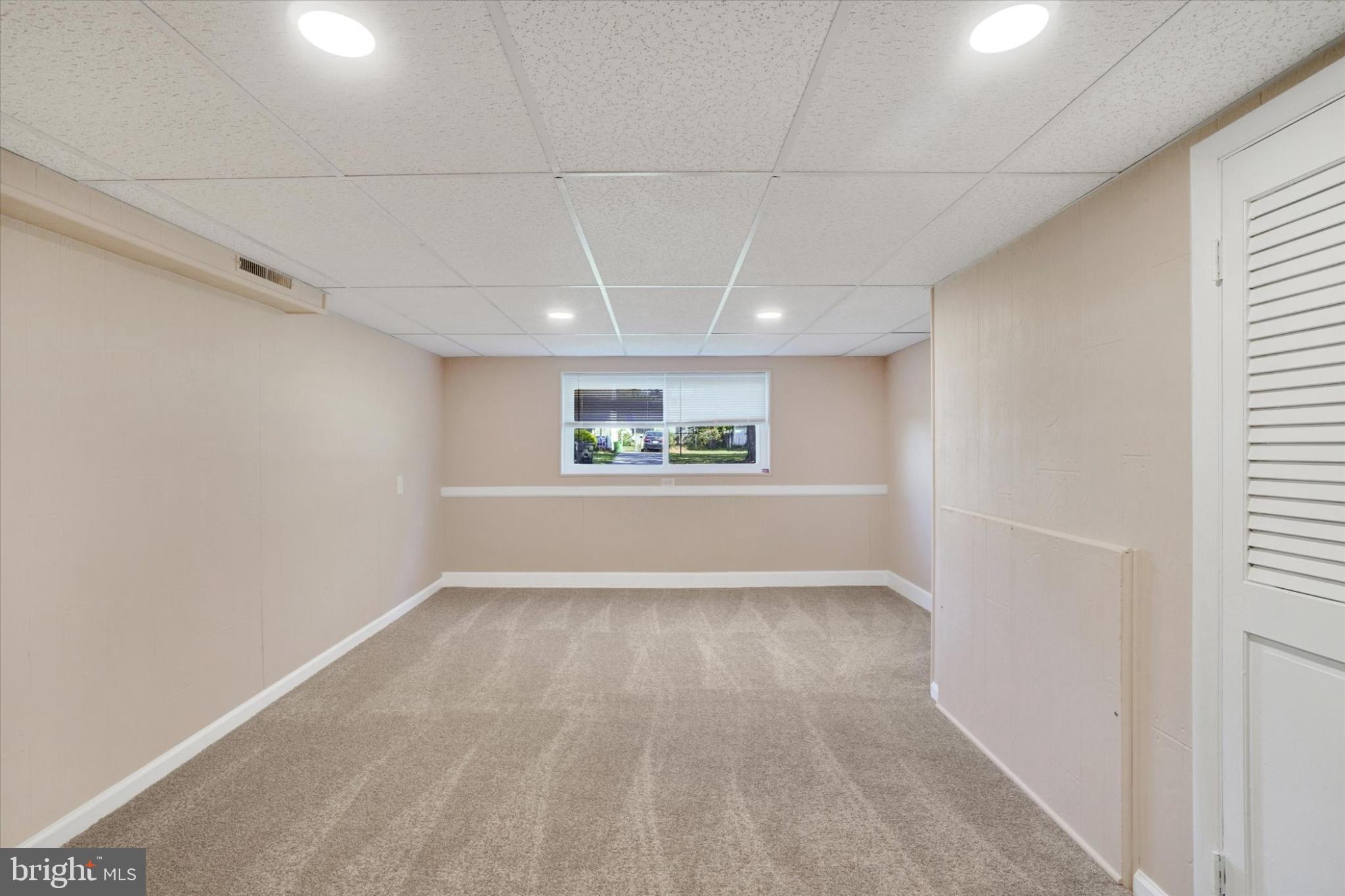 1212 Livingstone Road York, PA 17404 - Photo 20 of 24 an empty room with windows and entrance