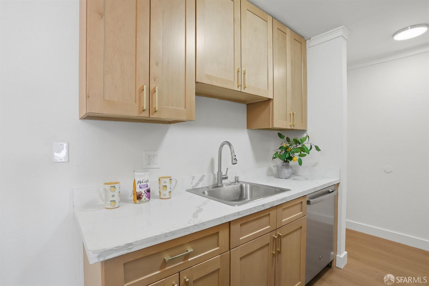 4081 Clayton Road, Unit 235 Concord, CA 94521 - Photo 11 of 27 a kitchen with stainless steel appliances granite countertop white cabinets a sink and dishwasher