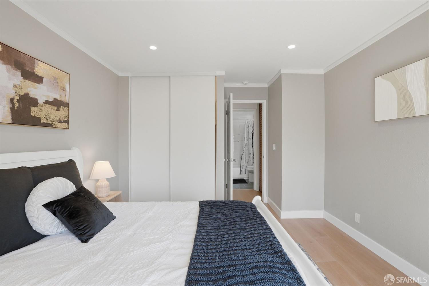 4081 Clayton Road, Unit 235 Concord, CA 94521 - Photo 15 of 27 a bedroom with a bed and a painting on the wall