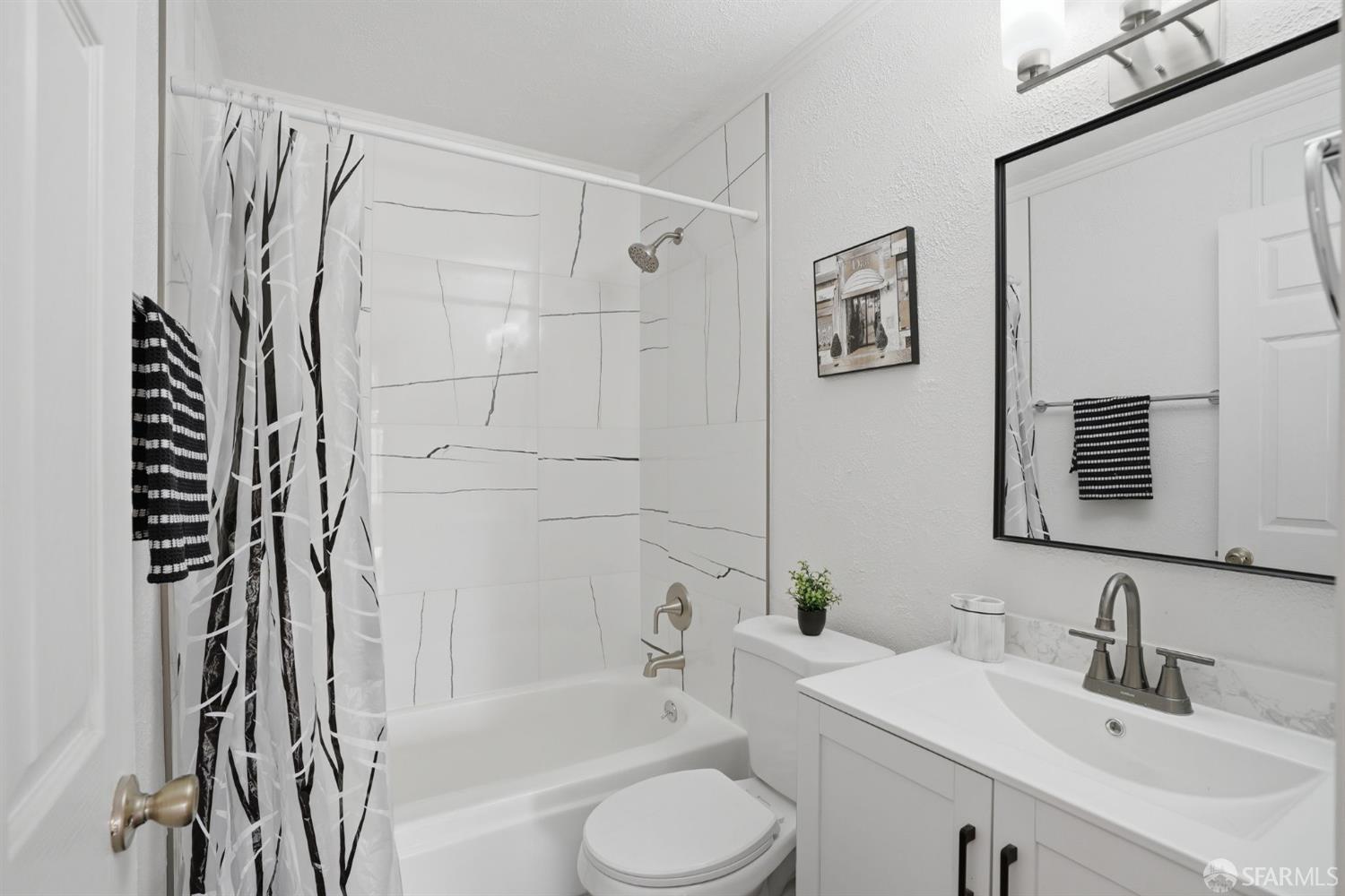 4081 Clayton Road, Unit 235 Concord, CA 94521 - Photo 16 of 27 a bathroom with a sink toilet and shower