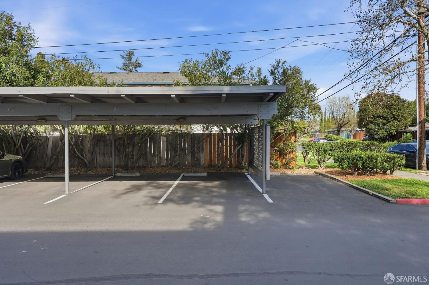 4081 Clayton Road, Unit 235 Concord, CA 94521 - Photo 25 of 27 a backyard of a house with lots of green space and outdoor seating