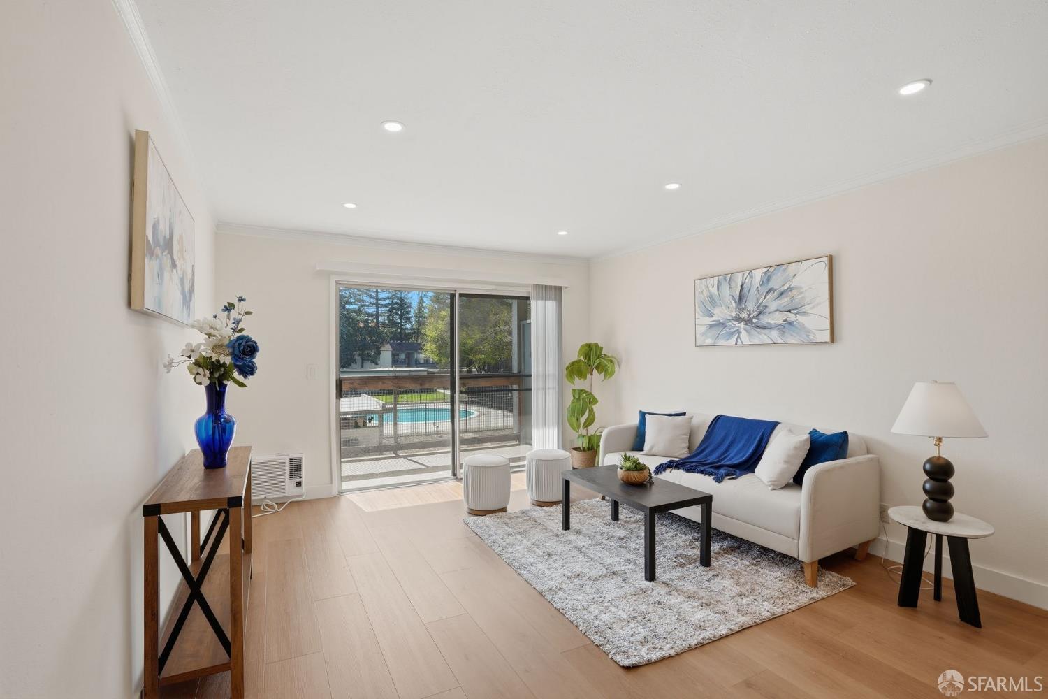 4081 Clayton Road, Unit 235 Concord, CA 94521 - Photo 8 of 27 a living room with furniture and a potted plant