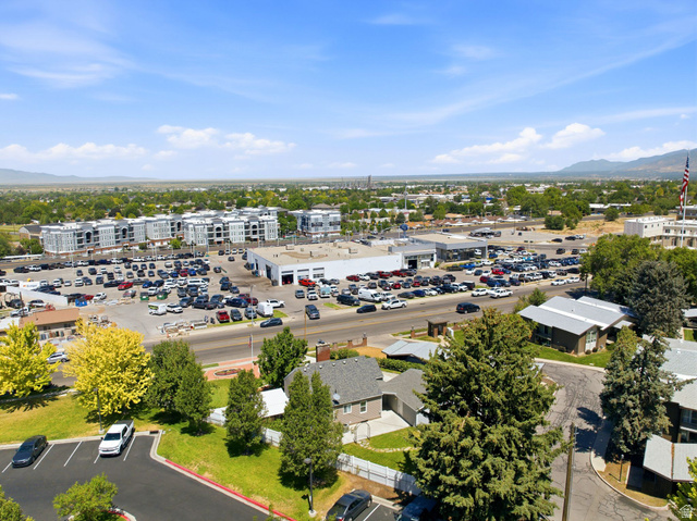 1925 South Main Street Bountiful, UT 84010 - Photo 39 of 48 Expansive aerial view showcasing a commercial district with multiple buildings and extensive parking areas