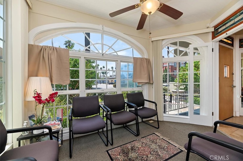 3845 Tenth Street Riverside, CA 92501 - Photo 11 of 45 a living room with furniture and a large window