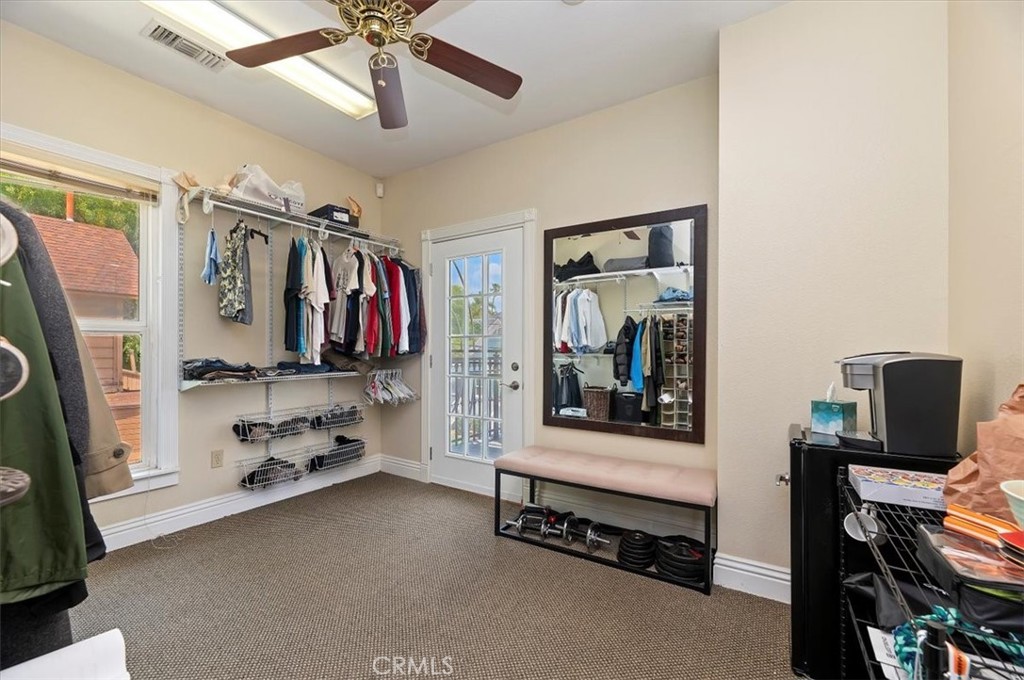 3845 Tenth Street Riverside, CA 92501 - Photo 31 of 45 a view of a livingroom with furniture and a flat screen tv
