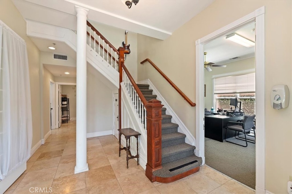 3845 Tenth Street Riverside, CA 92501 - Photo 8 of 45 a view of entryway and hall with wooden floor