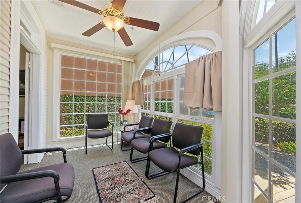 3845 Tenth Street Riverside, CA 92501 - Photo 10 of 45 a living room with furniture and a window
