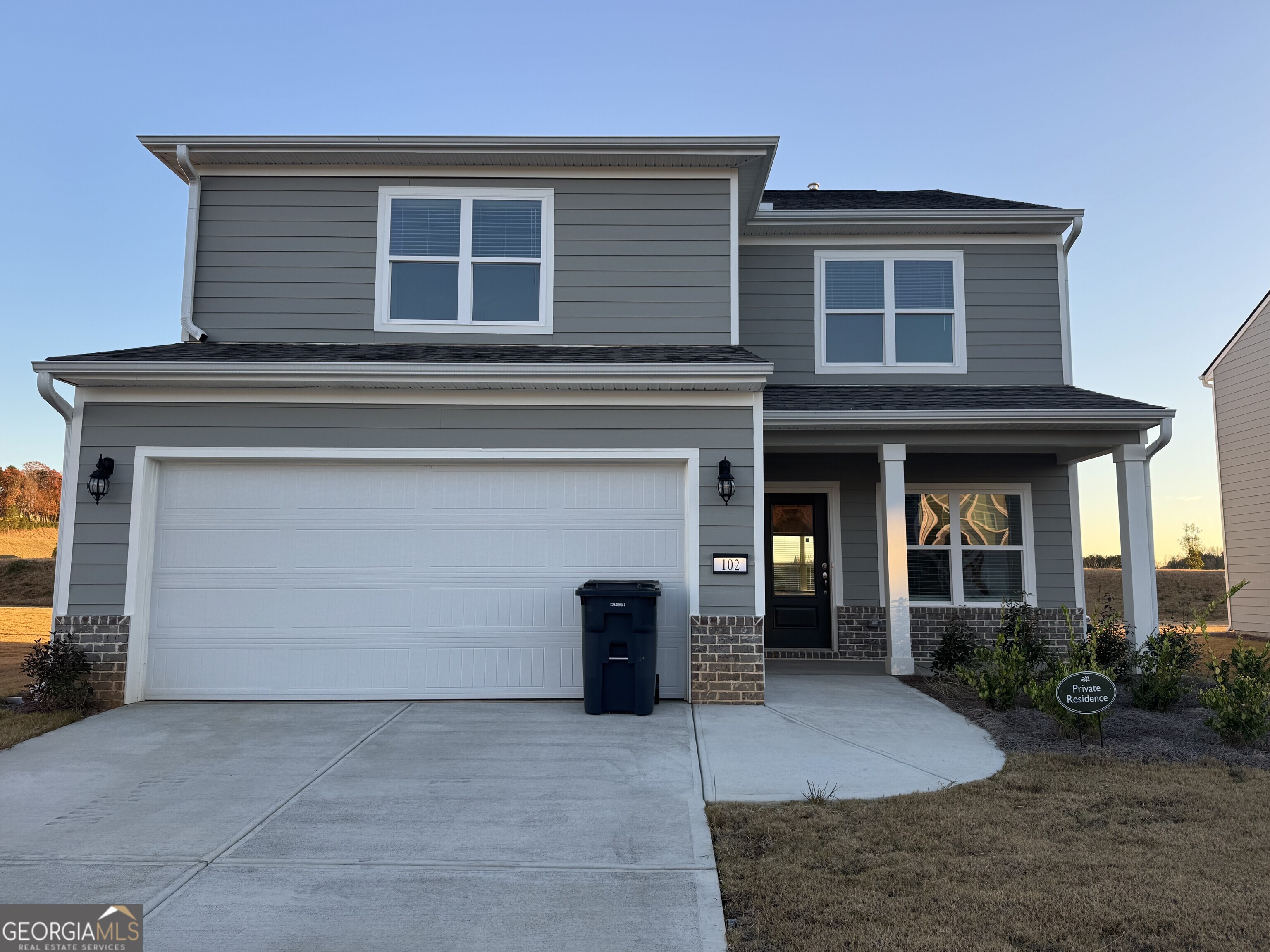 102 Lavender Circle Calhoun, GA 30701 - Photo 1 of 1 a front view of a house with yard