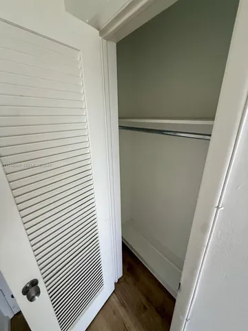 a view of outdoor sitting area with furniture and wooden deck