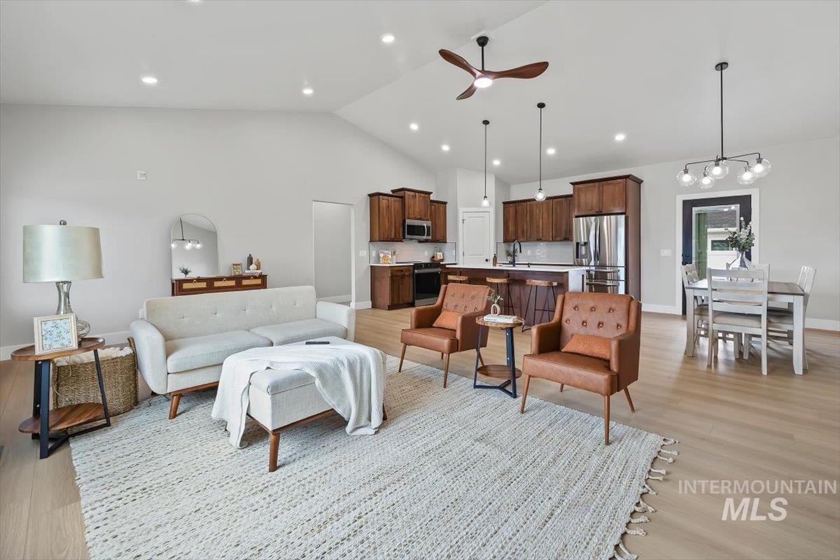 1201 Jade Drive Rupert, ID 83350 - Photo 4 of 27 Expansive open-concept living area featuring vaulted ceilings and recessed lighting
