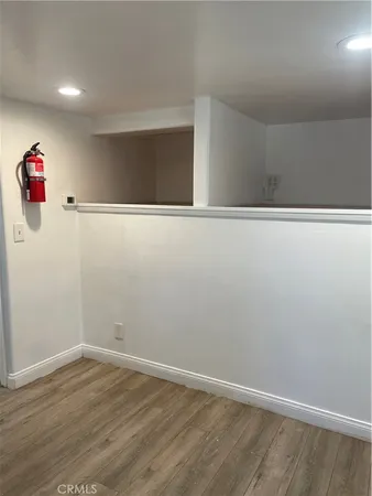 a bathroom with a sink toilet and mirror
