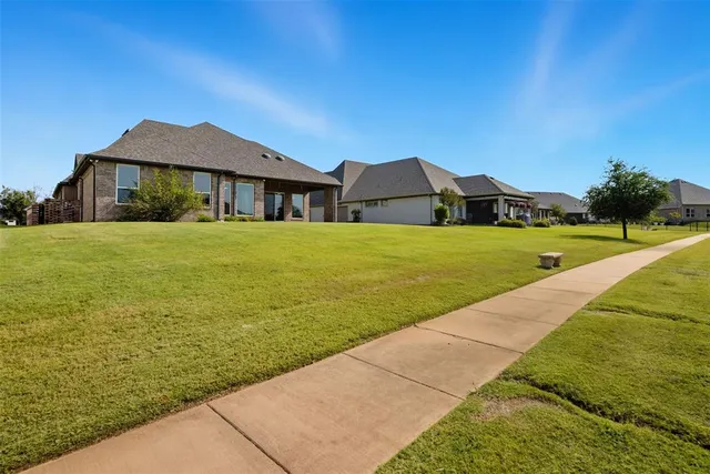 $585,000 | 6627 Pinehurst Drive, Granbury, TX 76049