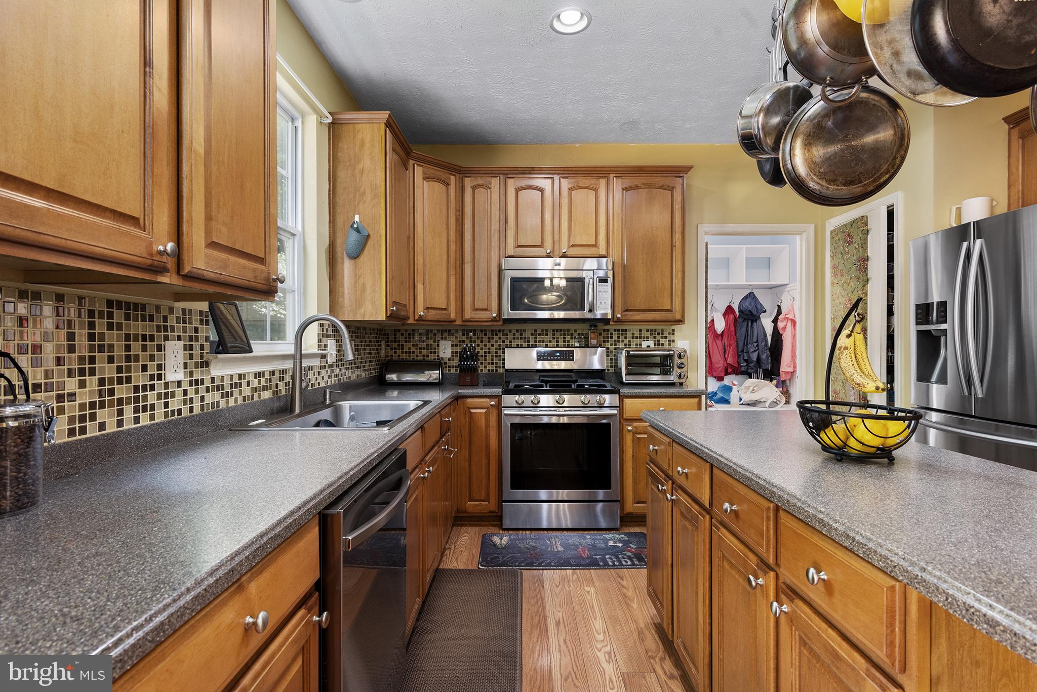 104 Patton Way Elkton, MD 21921 - Photo 11 of 34 CORIAN COUNTERTOPS, STAINLESS APPLIANCES