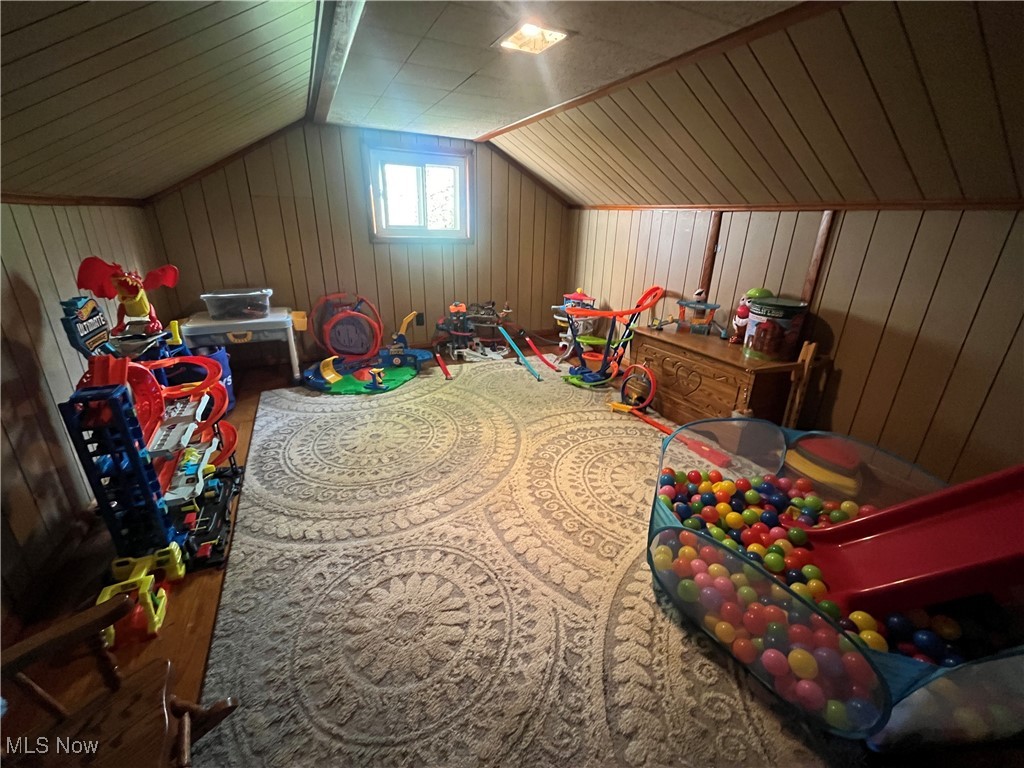 9355 Dozer Ridge Road Blue Rock, OH 43720 - Photo 13 of 23 Game room with vaulted ceiling and wood walls