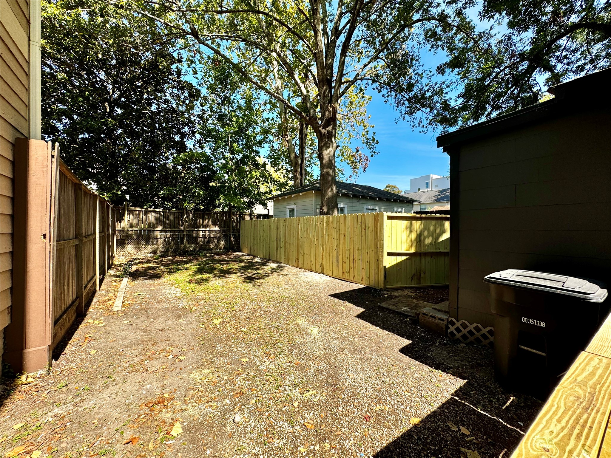 1018 Dunbar Street Houston, TX 77009 - Photo 20 of 30 Fully fenced backyard is secure for dogs or play space!