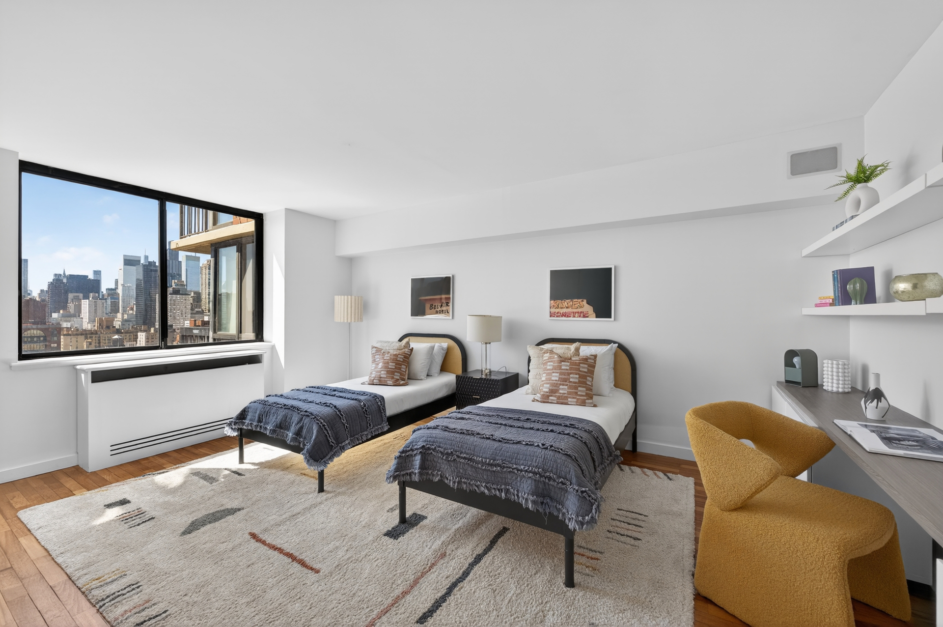 330 East 75th Street, Unit 28BC Manhattan, NY 10021 - Photo 10 of 17 a bedroom with furniture and a window