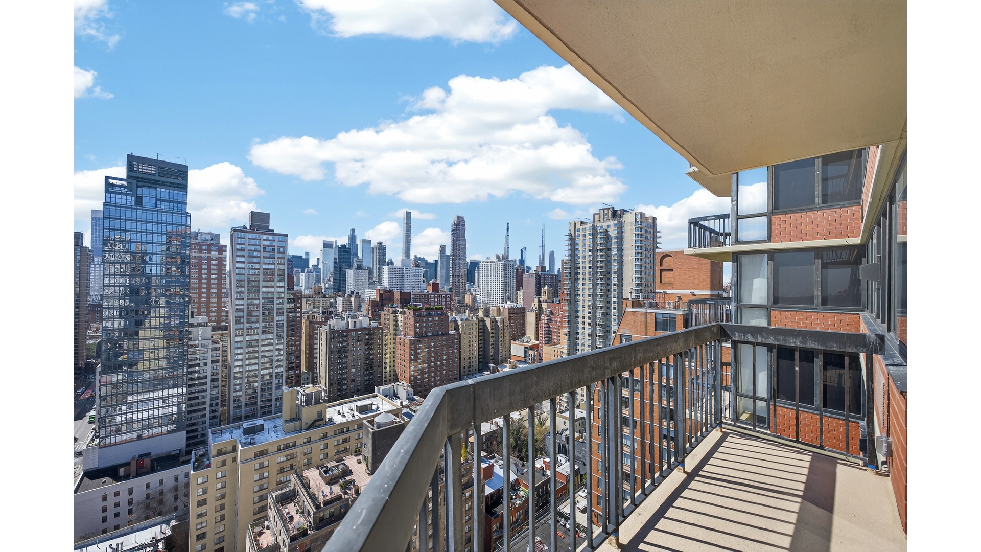 330 East 75th Street, Unit 28BC Manhattan, NY 10021 - Photo 14 of 17 a view of city from balcony