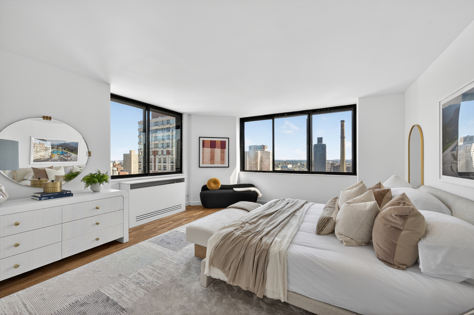 330 East 75th Street, Unit 28BC Manhattan, NY 10021 - Photo 7 of 17 a bedroom with a bed and a large window