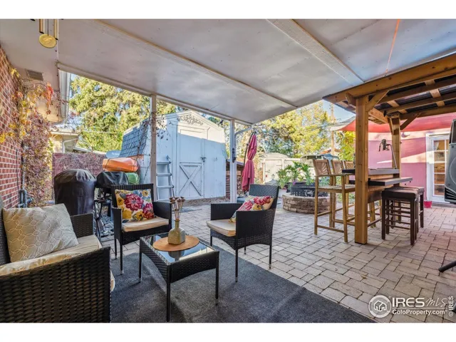 a outdoor living space with furniture and a potted plant