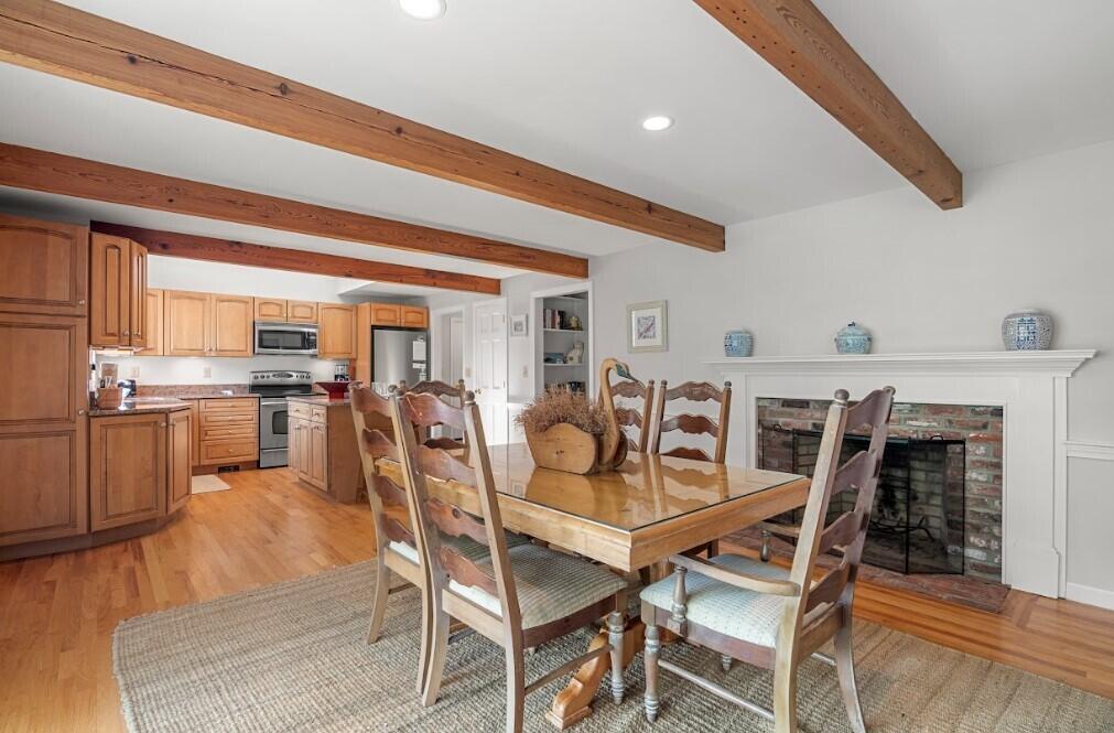 11 Fox Ridge Drive Orleans, MA 02653 - Photo 16 of 57 a view of a dining room with furniture and wooden floor