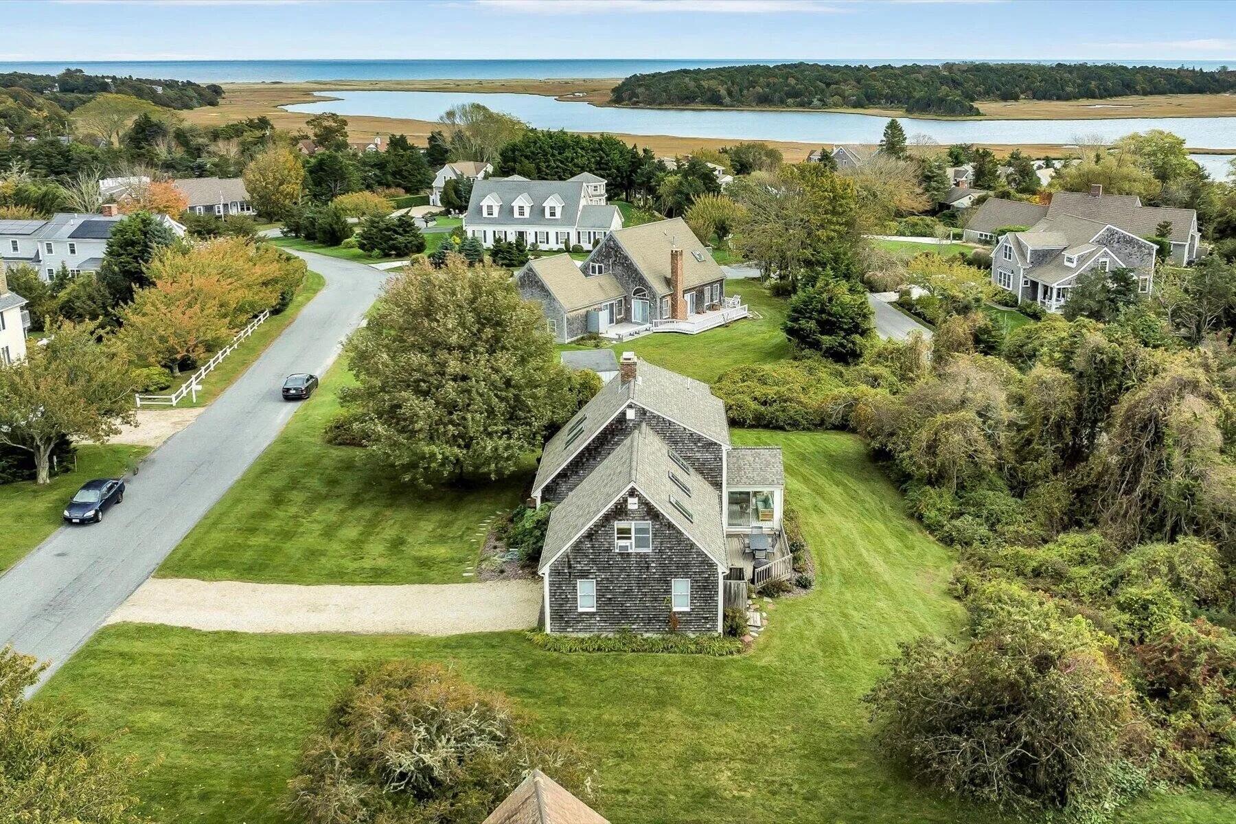 11 Fox Ridge Drive Orleans, MA 02653 - Photo 2 of 57 a view of a house with a lake view