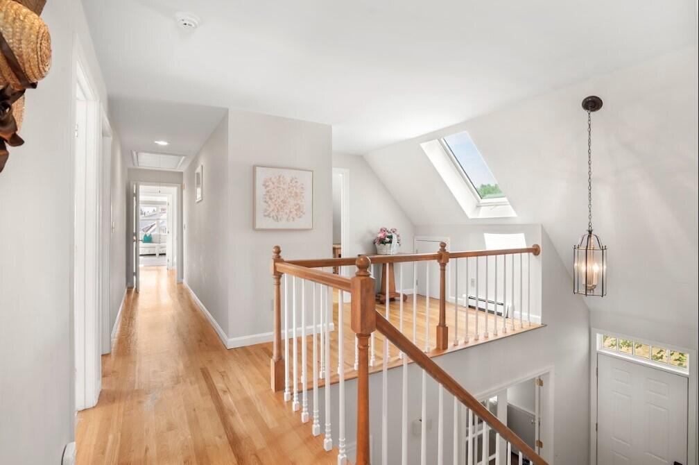 11 Fox Ridge Drive Orleans, MA 02653 - Photo 33 of 57 a view of a hallway with wooden floor and stairs