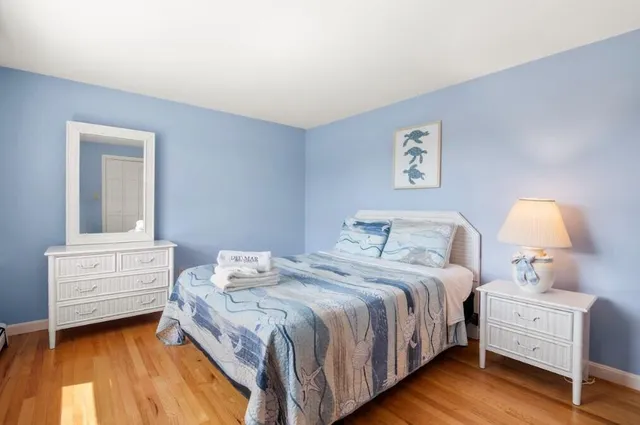 a bathroom with a granite countertop sink a window and a mirror
