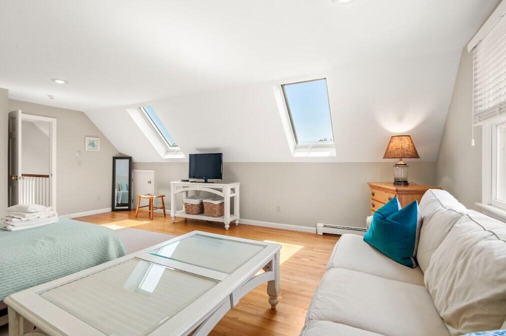 11 Fox Ridge Drive Orleans, MA 02653 - Photo 43 of 57 a living room with furniture and a flat screen tv