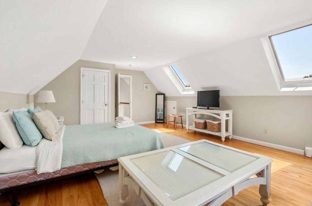 11 Fox Ridge Drive Orleans, MA 02653 - Photo 44 of 57 a living room with furniture and flat screen tv