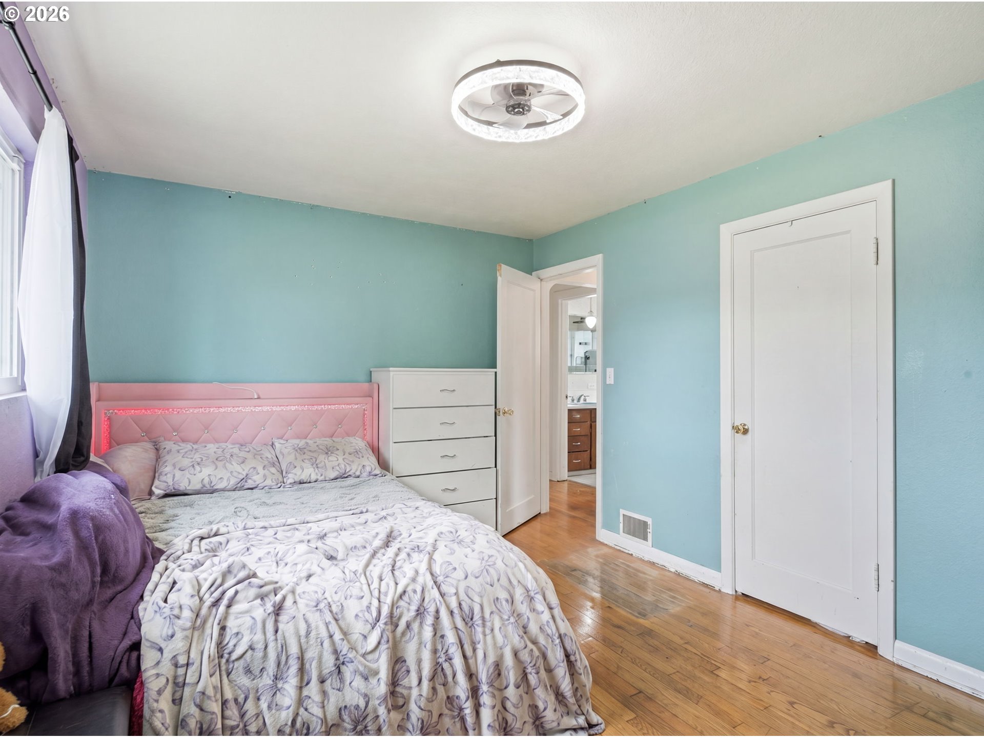 1357 Grove Street Lebanon, OR 97355 - Photo 18 of 37 a bedroom with a bed and a closet