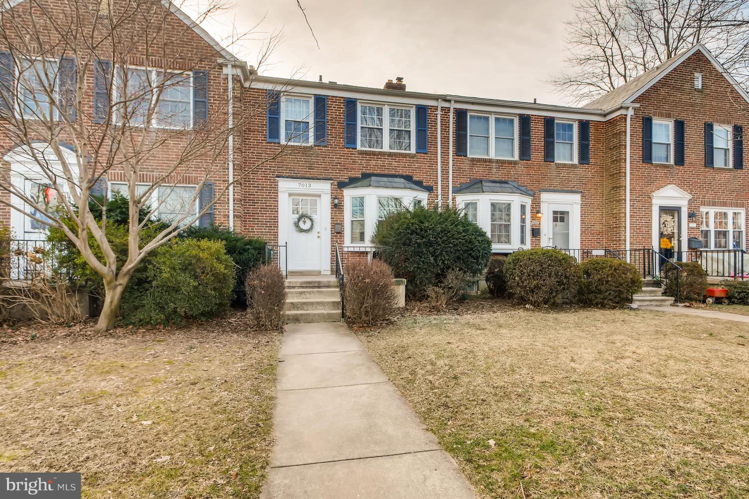 7013 Heathfield Road Baltimore, MD 21212 - Photo 1 of 33 a front view of a house with garden