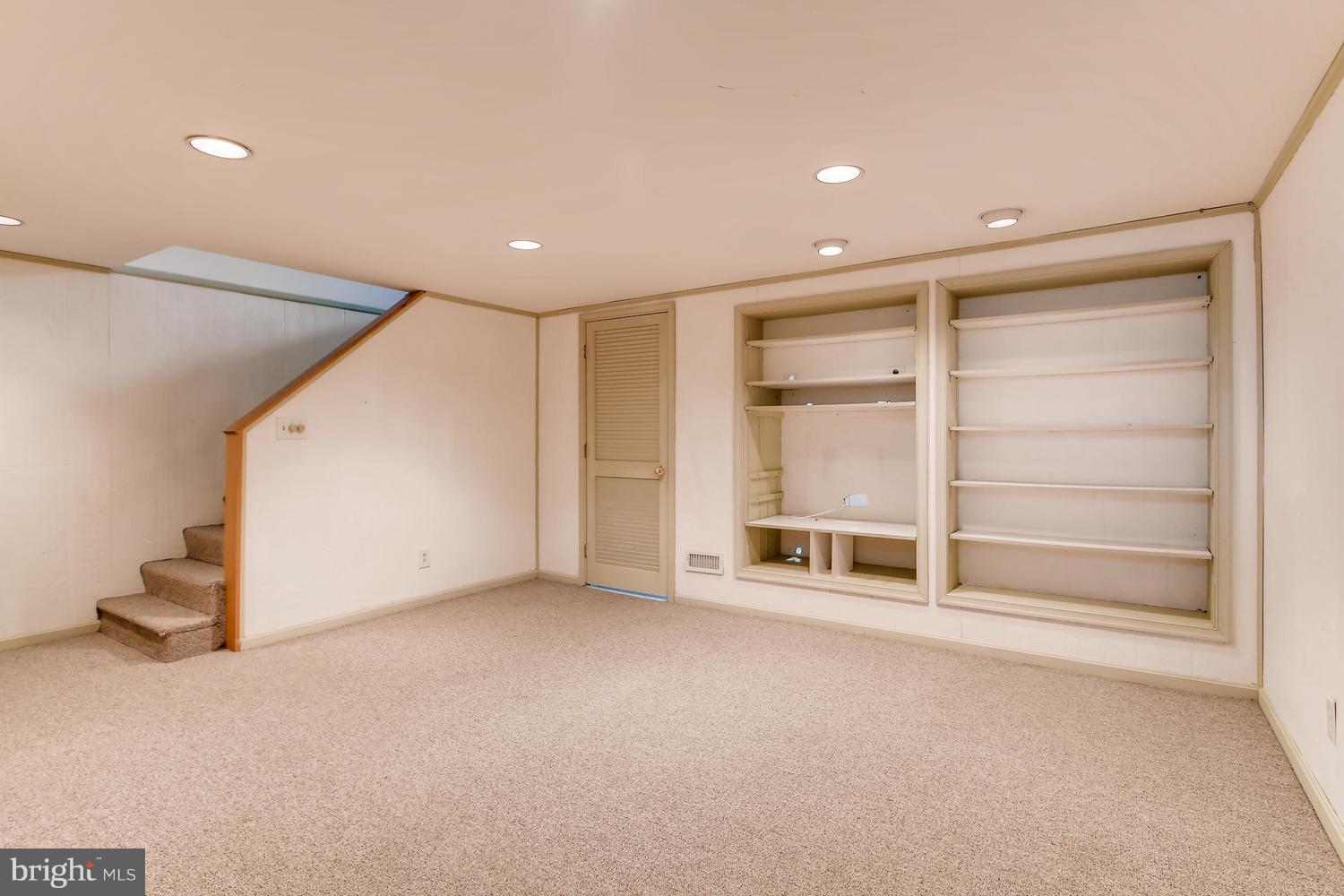 7013 Heathfield Road Baltimore, MD 21212 - Photo 22 of 33 a view of an empty room with a window