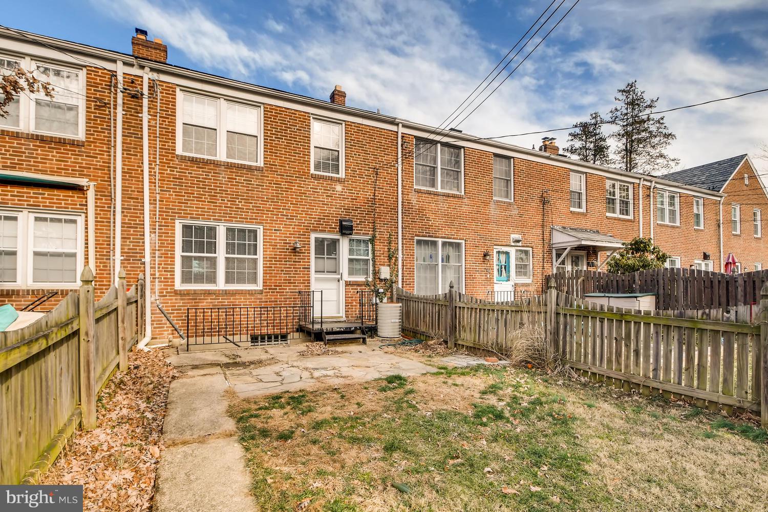 7013 Heathfield Road Baltimore, MD 21212 - Photo 26 of 33 a view of a house with a wooden fence