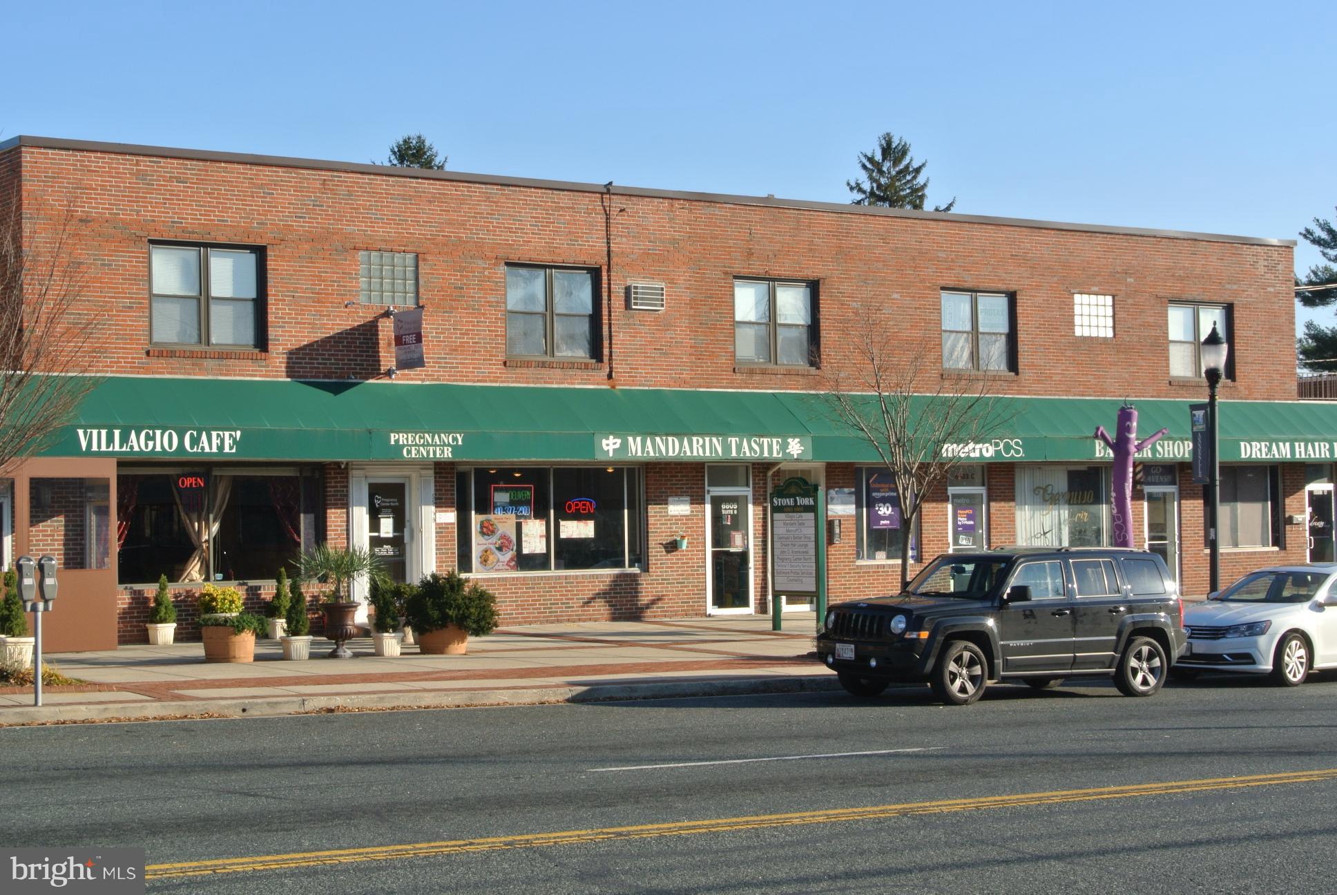 7013 Heathfield Road Baltimore, MD 21212 - Photo 33 of 33 a view of a building with car parked