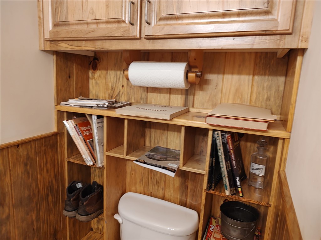 160 Sentell Road Williamston, SC 29697 - Photo 43 of 45 Custom wood paneling creates a unique, rustic powder room retreat.
