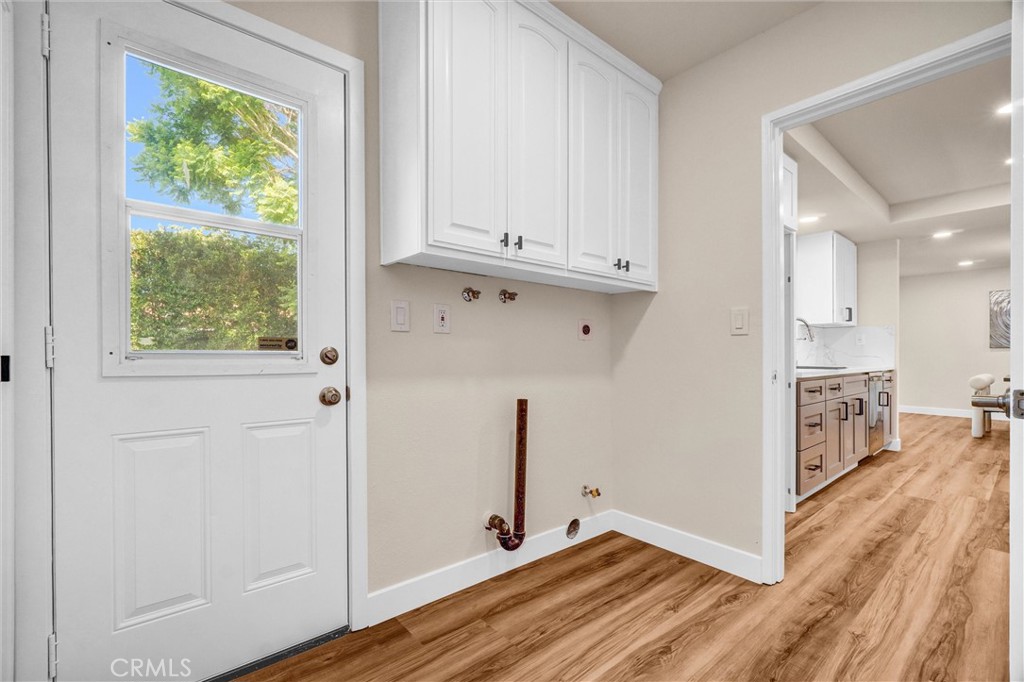 1355 Limerick Drive Placentia, CA 92870 - Photo 14 of 33 a view of a kitchen with wooden floor and a window