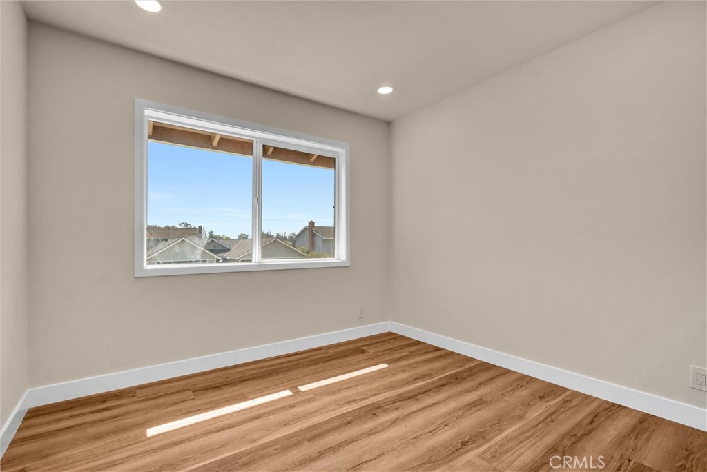1355 Limerick Drive Placentia, CA 92870 - Photo 18 of 33 a view of empty room with wooden floor and fan