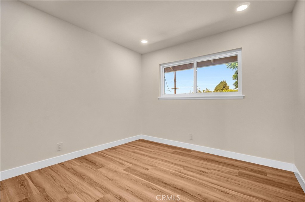 1355 Limerick Drive Placentia, CA 92870 - Photo 19 of 33 a view of empty room with wooden floor and fan