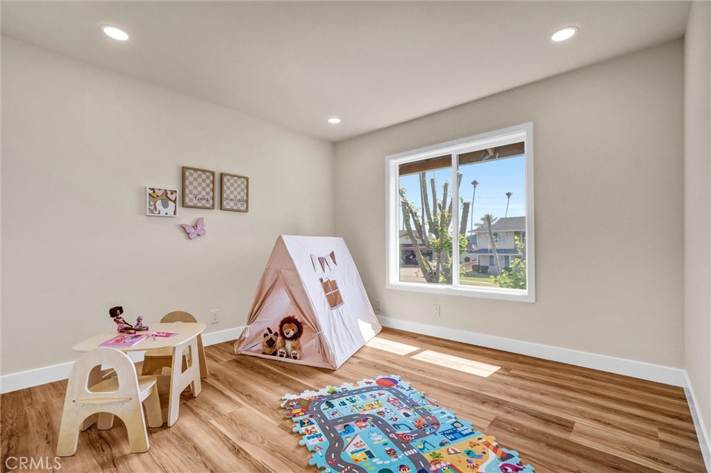 1355 Limerick Drive Placentia, CA 92870 - Photo 22 of 33 a room with furniture and a wooden floor