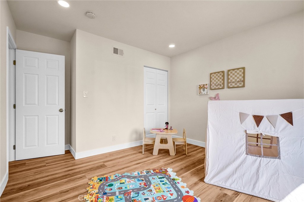 1355 Limerick Drive Placentia, CA 92870 - Photo 23 of 33 a living room with furniture and a wooden floor