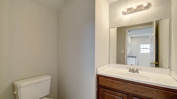 a bathroom with a sink and a toilet