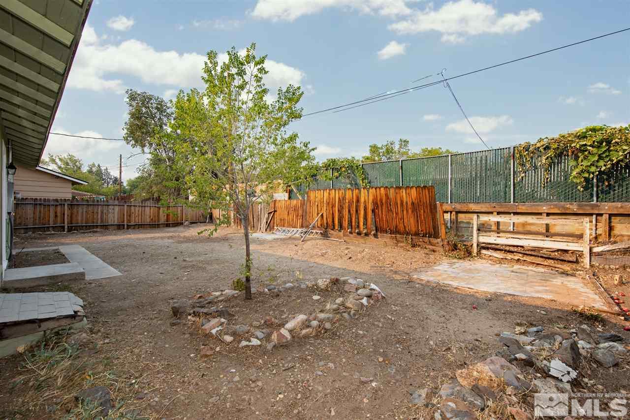 625 Akard Circle Reno, NV 89503 - Photo 23 of 27 a backyard of a house with lots of green space